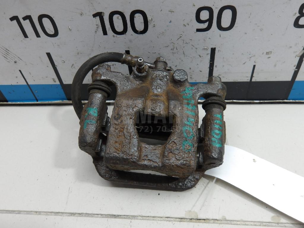 Суппорт тормозной задний левый 44011EM11A Nissan